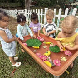 The girls enjoying the spring inspired sensory tray!
