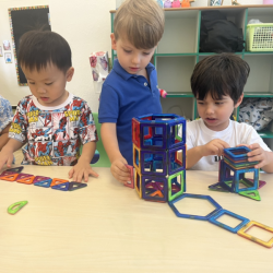 Leo and Milan built a train and train station. 