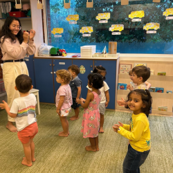 Working on our dance for Hot Cross Buns!