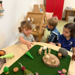 Immy and Cru at our small world play area having fun with bunnies and other farm animals!