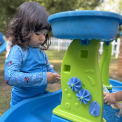 Lulu having some water wheel fun