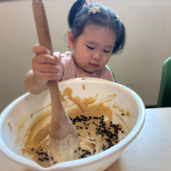 Ellie mixing in the choc chips!