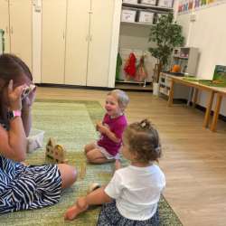 Enjoying looking through the coloured blocks!