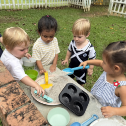 Enjoying the wet sand play!