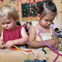 Ollie and Amelia practicing their threading