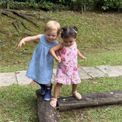 Ollie and Skyla trying to walk the tree trunk together!