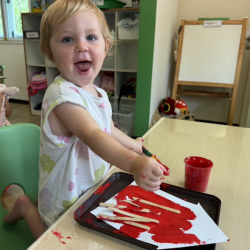Ollie enjoying painting her barn