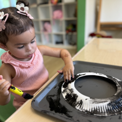 Skyla painting her snorkel! 