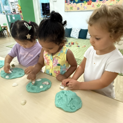 The girls making shell prints!