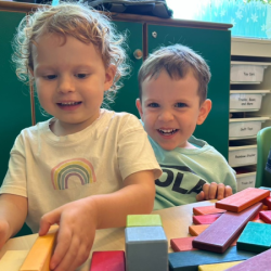 Rosie and Luca are sharing a seat.