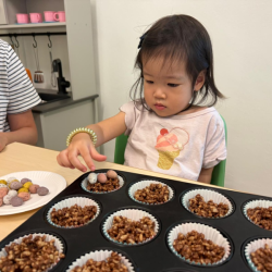 Constance is making chocolate nests.