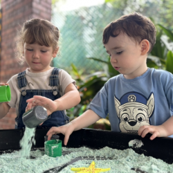 Messy sand, happy hands! Scoop, pour, and explore!