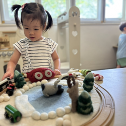 Winter wonder in her hands — Constance dives into snowy small world play!