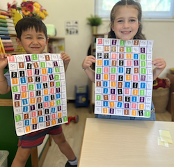 Alex and Elenna proudly completed their number activity.