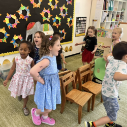 Busy-bees-having-fun-with-Christmas-musical-chairs