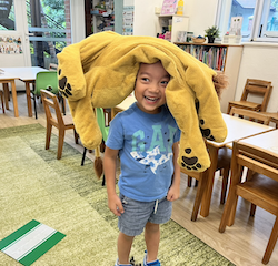 Ei having fun with our class toys .