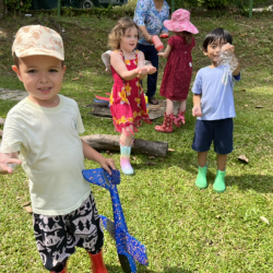 Finley, Lorenzo and Paige excited to catch the big bubbles on their hands.
