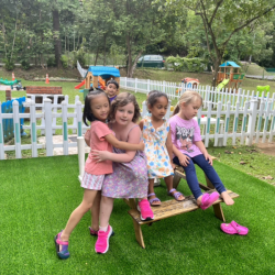 Girls enjoying some fresh air after their yummy treat.