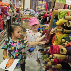 Lucy and Regan at the textile shop.
