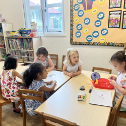 The girls are enjoying the game if bingo.