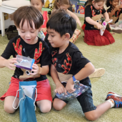 Trevor and Lorenzo checking out their gift.