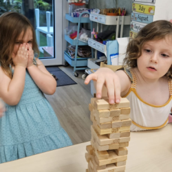 Vivi and Paige having fun playing Jenga.