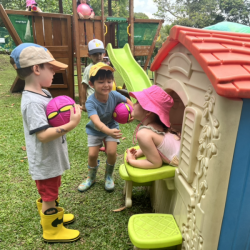 Vivi selling ice-cream to Alex, Luca and Wilbur.