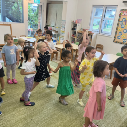 Busy bees dancing to the alphabet song .
