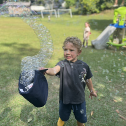 Kalle having fun with bubbles.