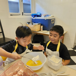 Lincoln and Enzo having a great time at cookery session.