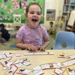 Vivi tickled by her silly sentence.