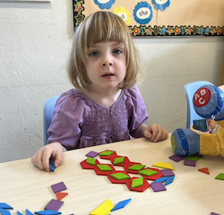 Clara having fun creating patterns.