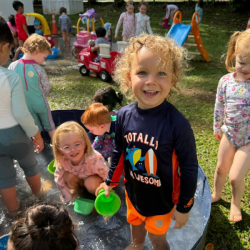 Enjoying the water play on a hot day!