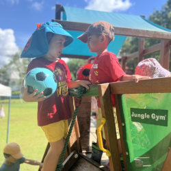 Enzo and Kalle having fun on the pirate ship .