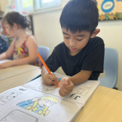 Enzo doing a great job on his sound book.