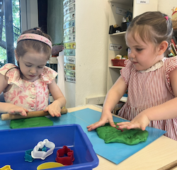 Esme and Vivi having fun with play dough.
