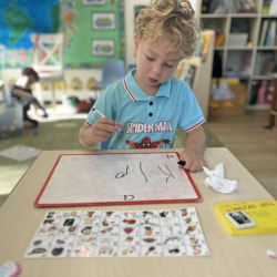 Kalle practicing his name writing.