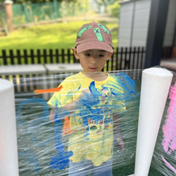 Lorenzo getting creative with his painting.