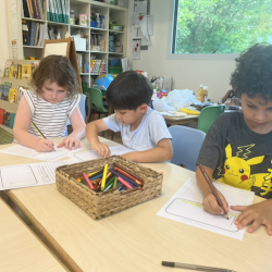Luca, Alex and Paige working on their journal writing.