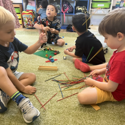 Rowan and Wilbur having fun playing pick the stick.