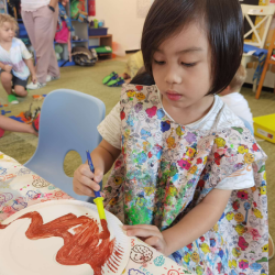 Kane  is painting his christmas pudding