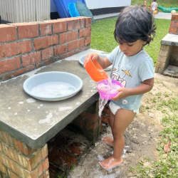 Aarav practising his pouring