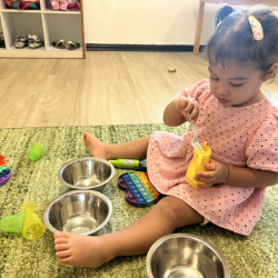 Alba having a tea party.