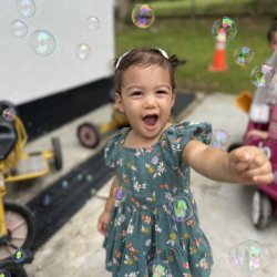 Alba loving all the bubbles!