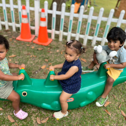 Amara, Alba and Aarav on the seesaw together!