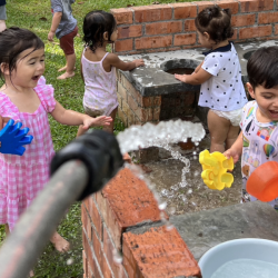 Ellie and Milan getting a hose down!