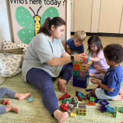Leo, Ellie, Teddy building with the magnetic tiles with Miss Alyssya