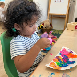 Una painting her Diya and hand!