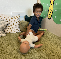 Teddy-feeding-the-baby