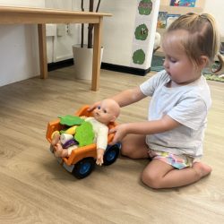 Charlotte keeping her baby warm with some lettuce!